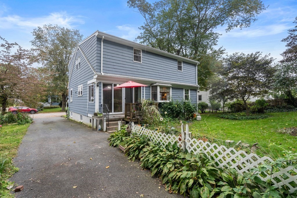 17 Centre Lane Milton, MA 02186 - Photo 25 of 26 a view of a house with a yard and garden