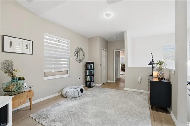 a view of livingroom with furniture and window