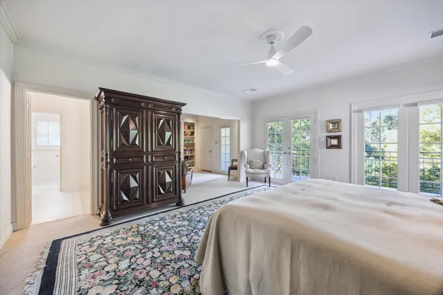 a living room with furniture and white walls