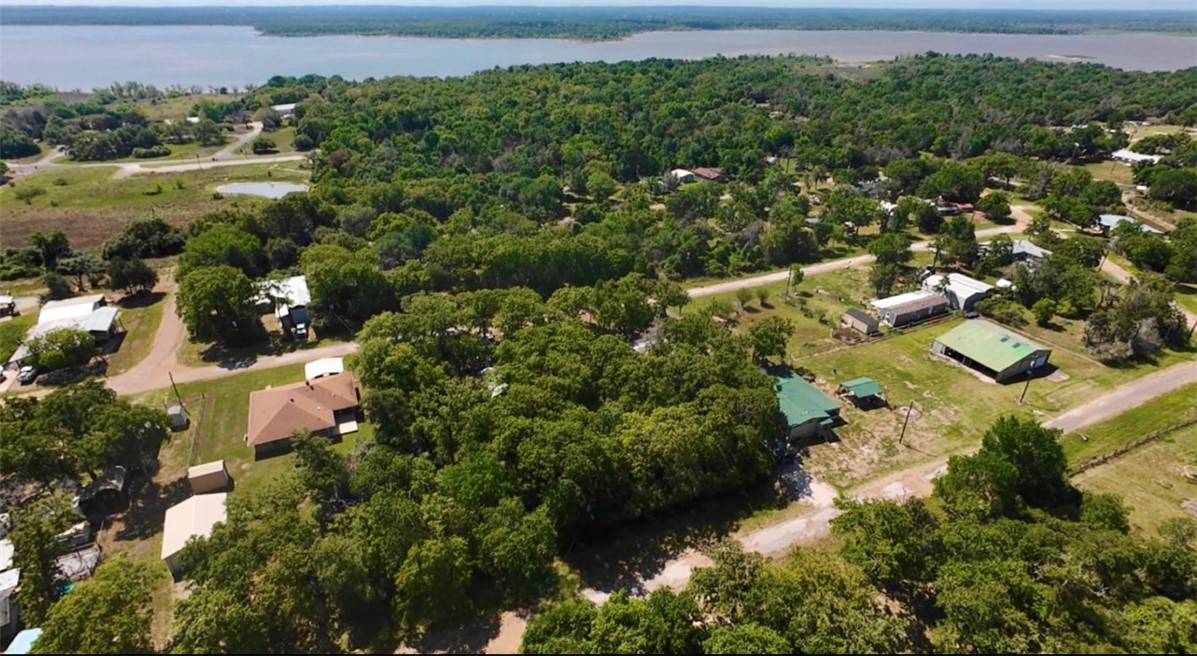 107 Live Oak Lane, Unit A Somerville, TX 77879 - Photo 2 of 5 an aerial view of residential house with outdoor space and swimming pool