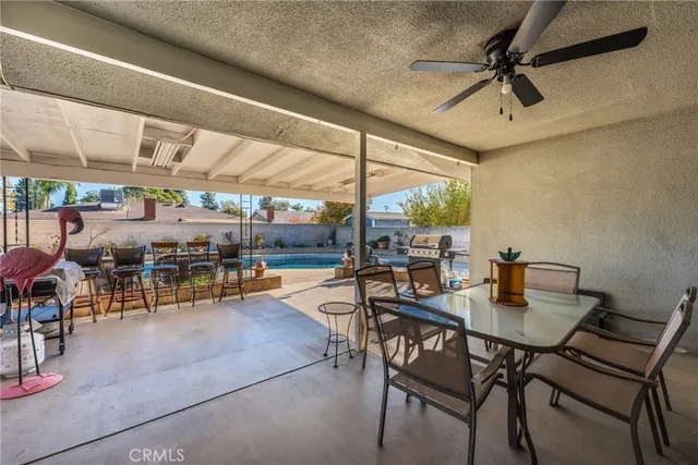 a view of a tables and chairs in a room