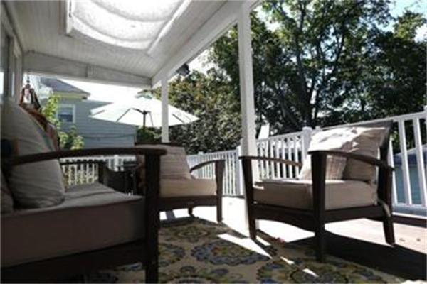 26 Barrington Road Boston, MA 02124 - Photo 5 of 10 a view of a chairs and table in the balcony