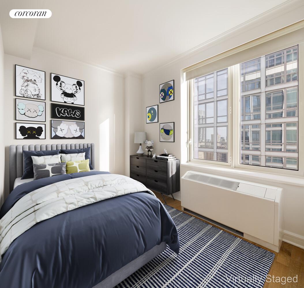 80 Riverside Boulevard, Unit 36B Manhattan, NY 10069 - Photo 16 of 25 a bedroom with a bed and a large window