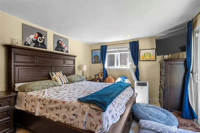 a bedroom with a bed and furniture