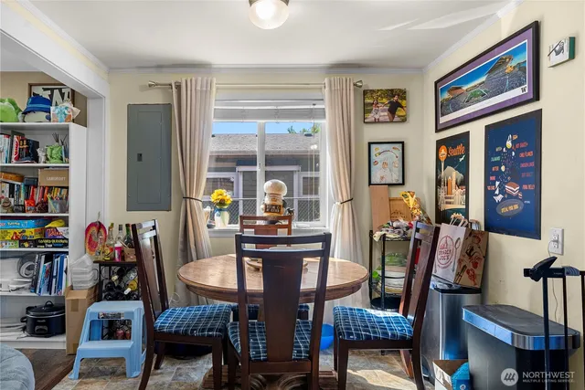 a kitchen with stainless steel appliances a stove a sink and a refrigerator