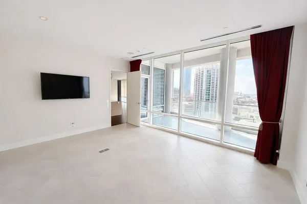 an empty room with windows