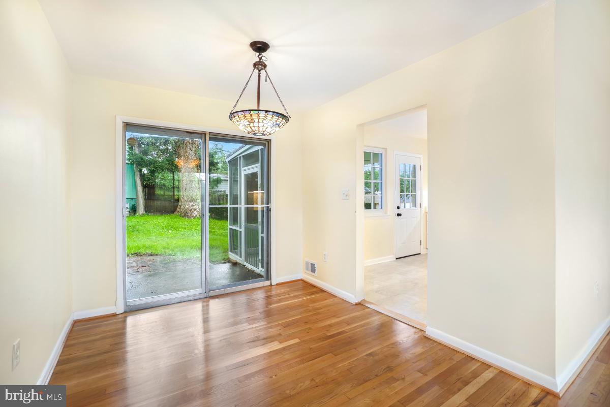 804 Gregorio Drive Silver Spring, MD 20901 - Photo 10 of 33 a view of a room with wooden floor portable swimming pool and outdoor space
