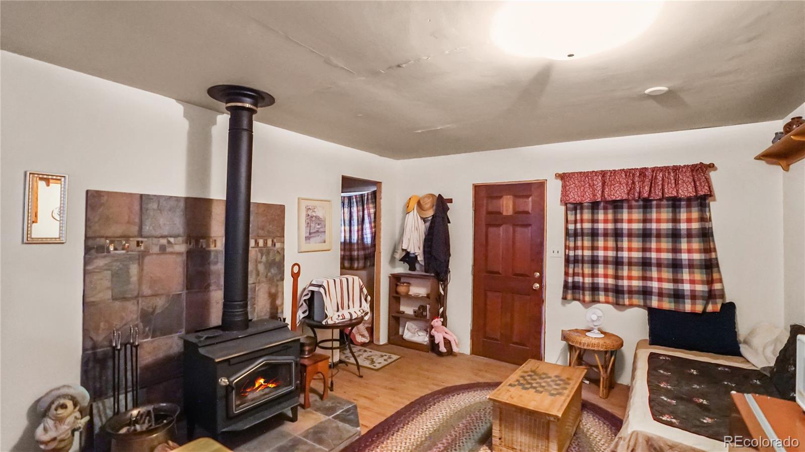 109 Wolf Road Bailey, CO 80421 - Photo 5 of 12 a view of a room with gym equipment