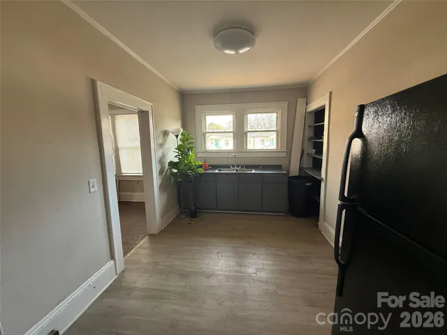 a view of a hallway with workspace