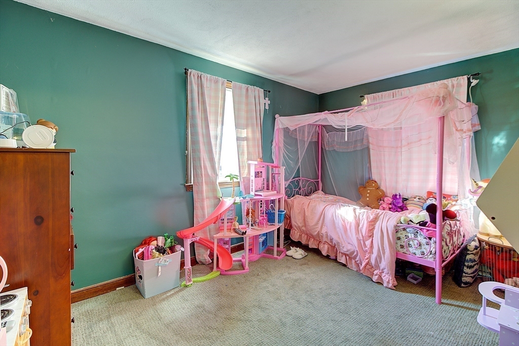 10 Stanford Road Franklin, MA 02038 - Photo 17 of 27 a bedroom with a bed and a window