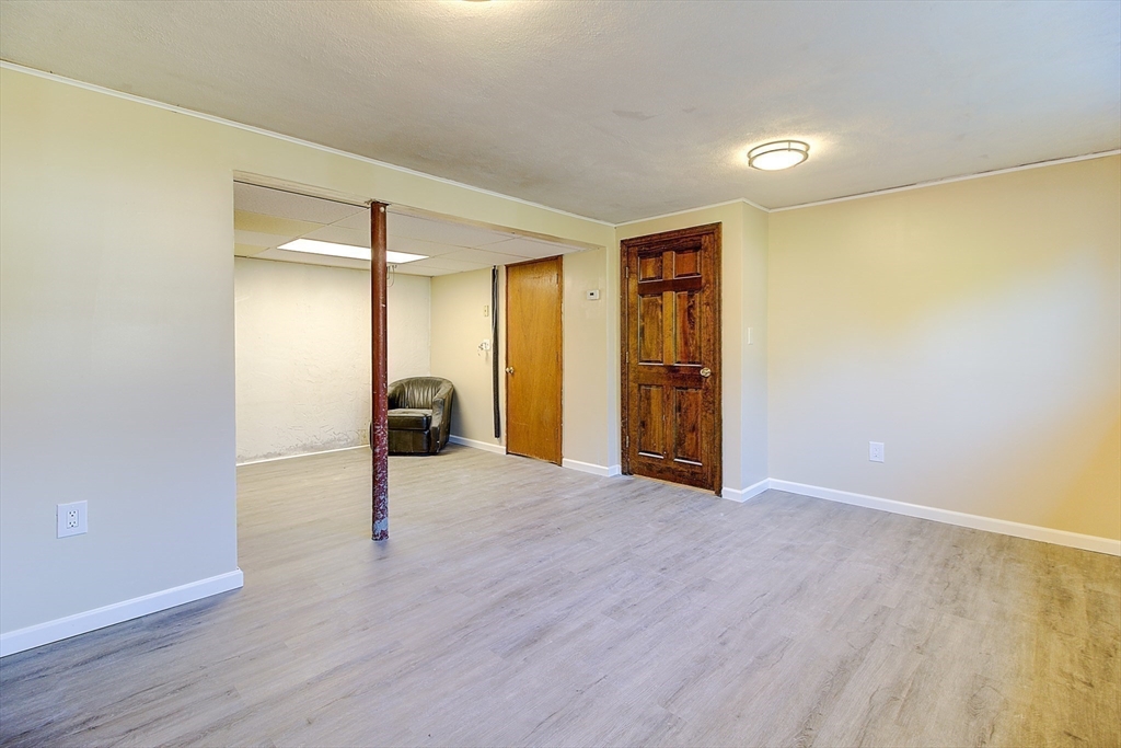 10 Stanford Road Franklin, MA 02038 - Photo 21 of 27 a view of empty room with wooden floor