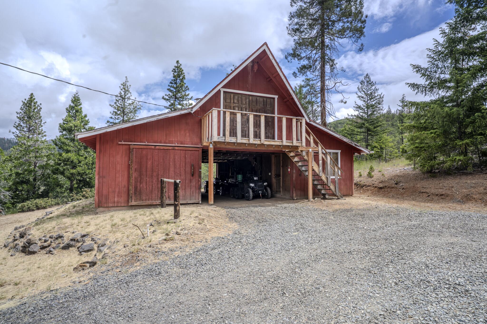 1969 Colestin Road Ashland, OR 97520 - Photo 56 of 72 a front view of a house with a yard and garage