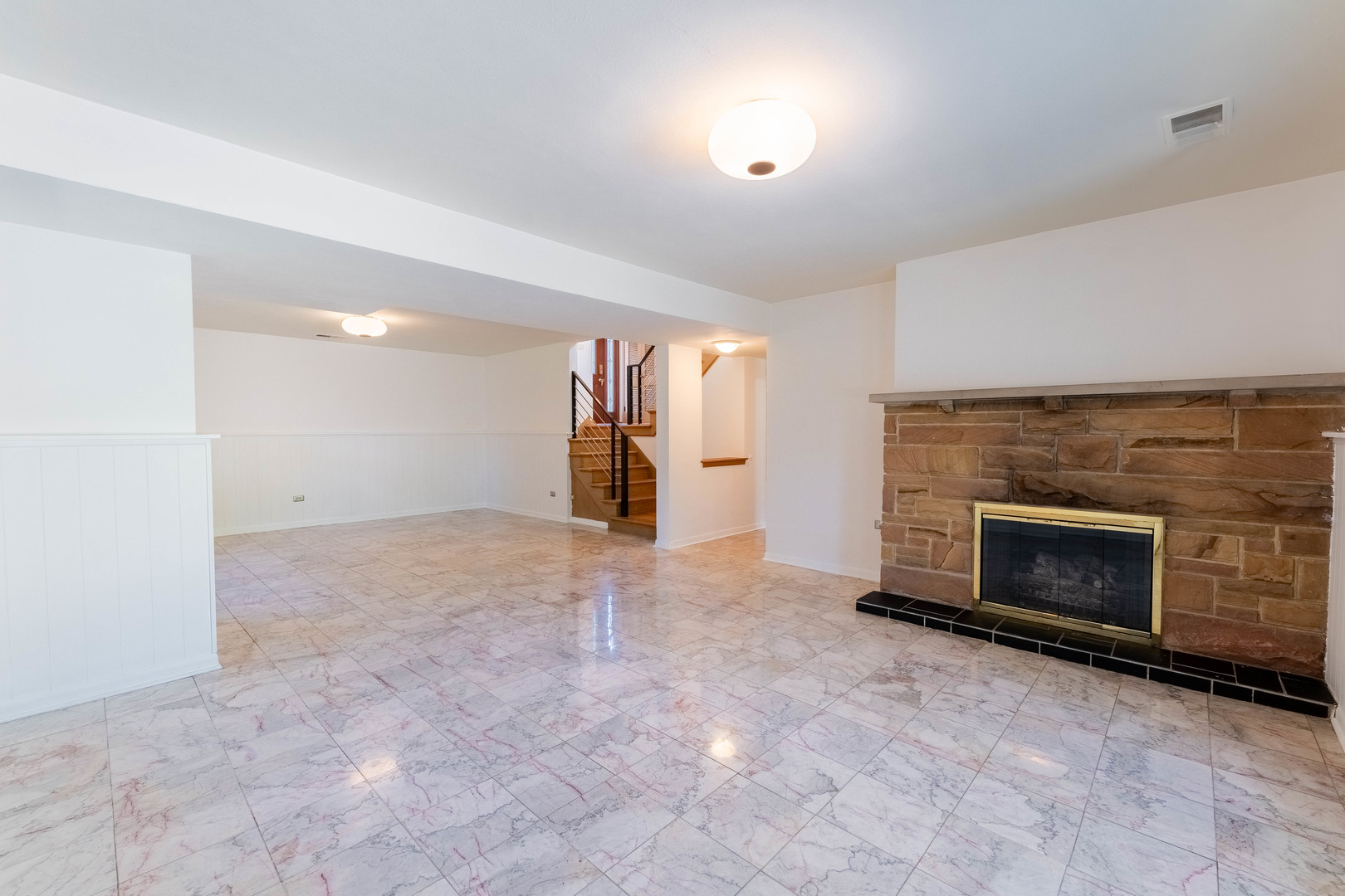 2130 Birch Street Park Ridge, IL 60068 - Photo 13 of 47 an empty room with fireplace and windows