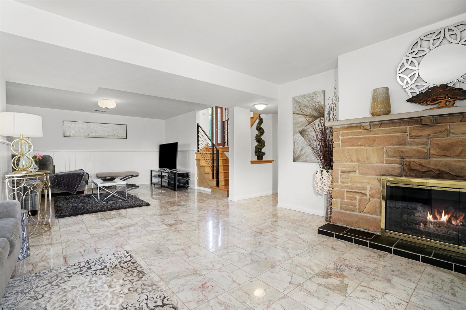 2130 Birch Street Park Ridge, IL 60068 - Photo 14 of 47 a living room with furniture and a fireplace