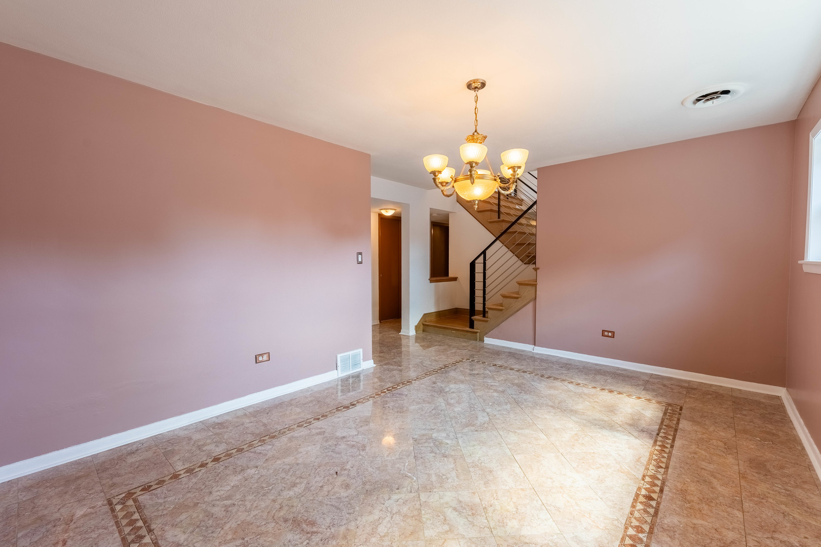 2130 Birch Street Park Ridge, IL 60068 - Photo 16 of 47 a view of a chandelier fan and entryway