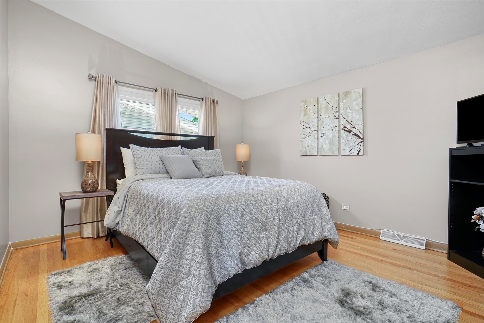 2130 Birch Street Park Ridge, IL 60068 - Photo 24 of 47 a bedroom with a bed and a tv on table