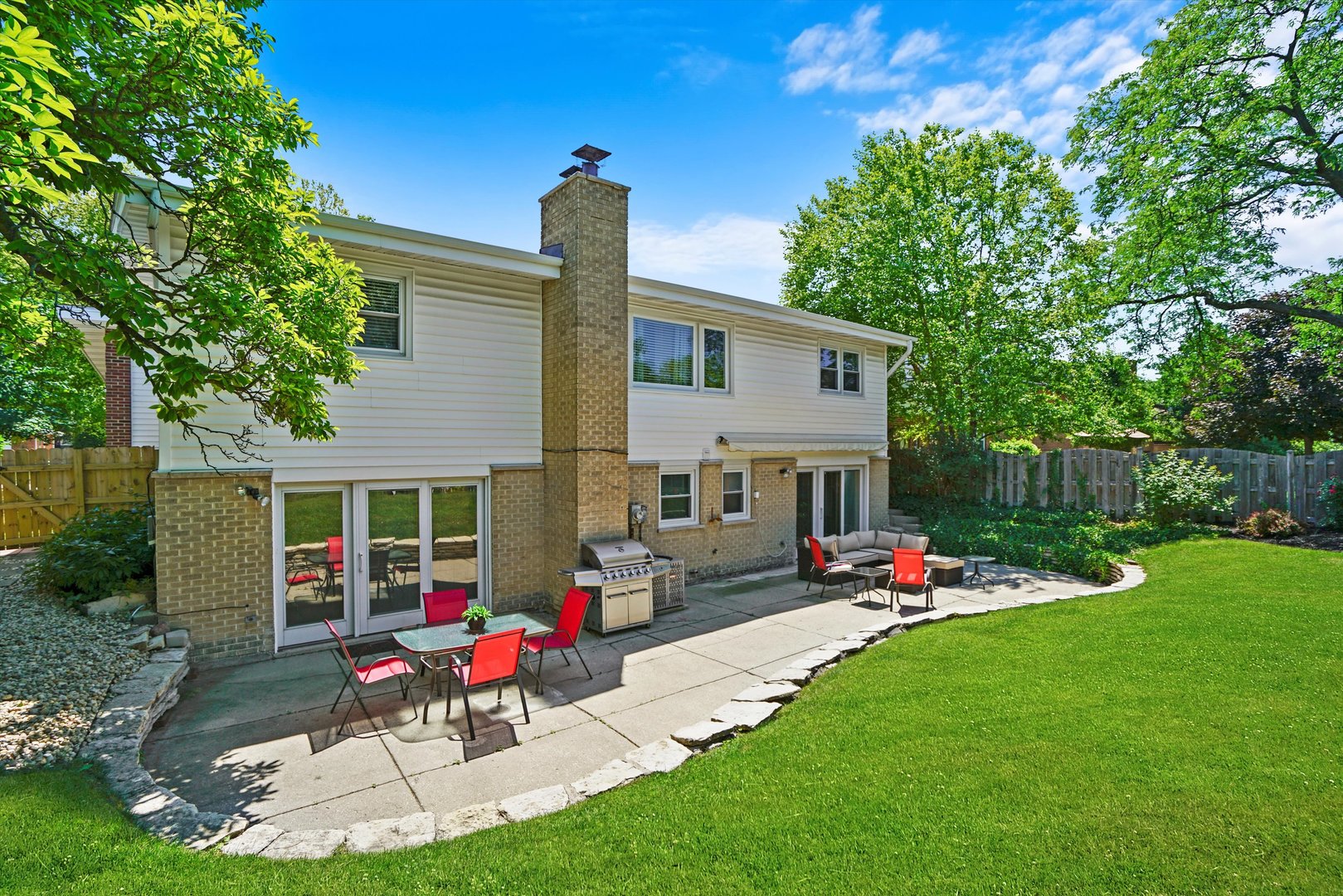 2130 Birch Street Park Ridge, IL 60068 - Photo 38 of 47 a view of a house with backyard and a slide