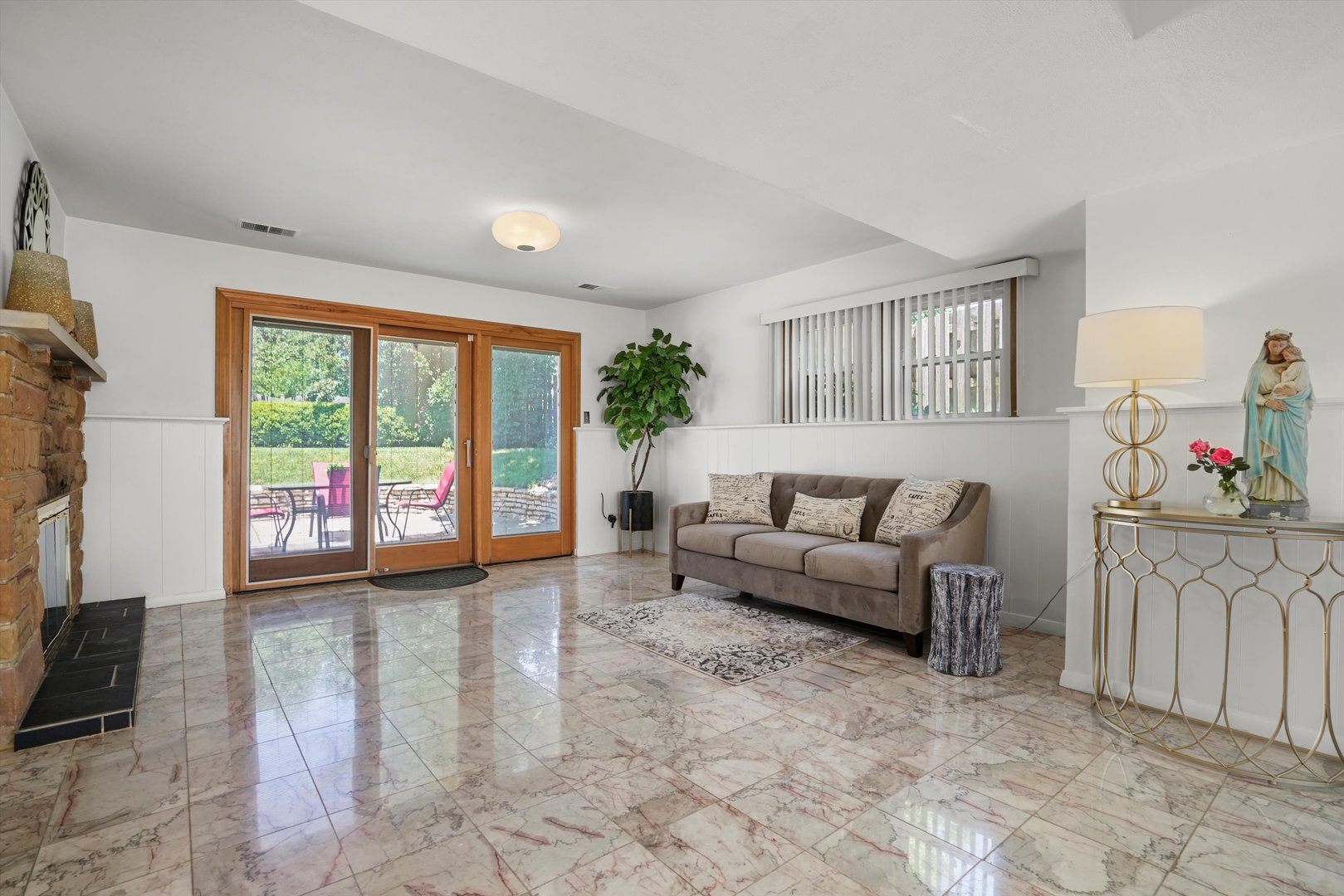 2130 Birch Street Park Ridge, IL 60068 - Photo 9 of 47 a living room with furniture and a flat screen tv