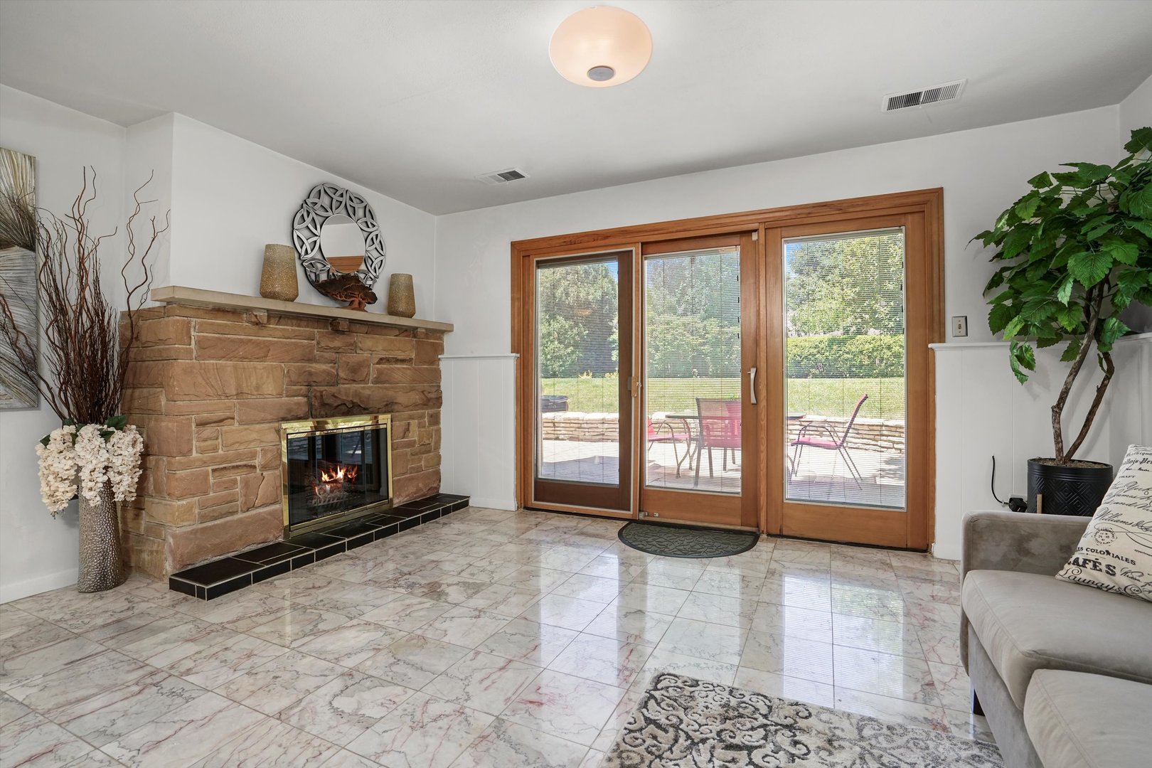 2130 Birch Street Park Ridge, IL 60068 - Photo 10 of 47 a living room with furniture and a fireplace