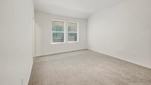 an empty room with an entryway
