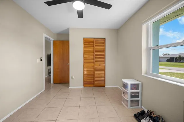 a view of an house with backyard space and garden