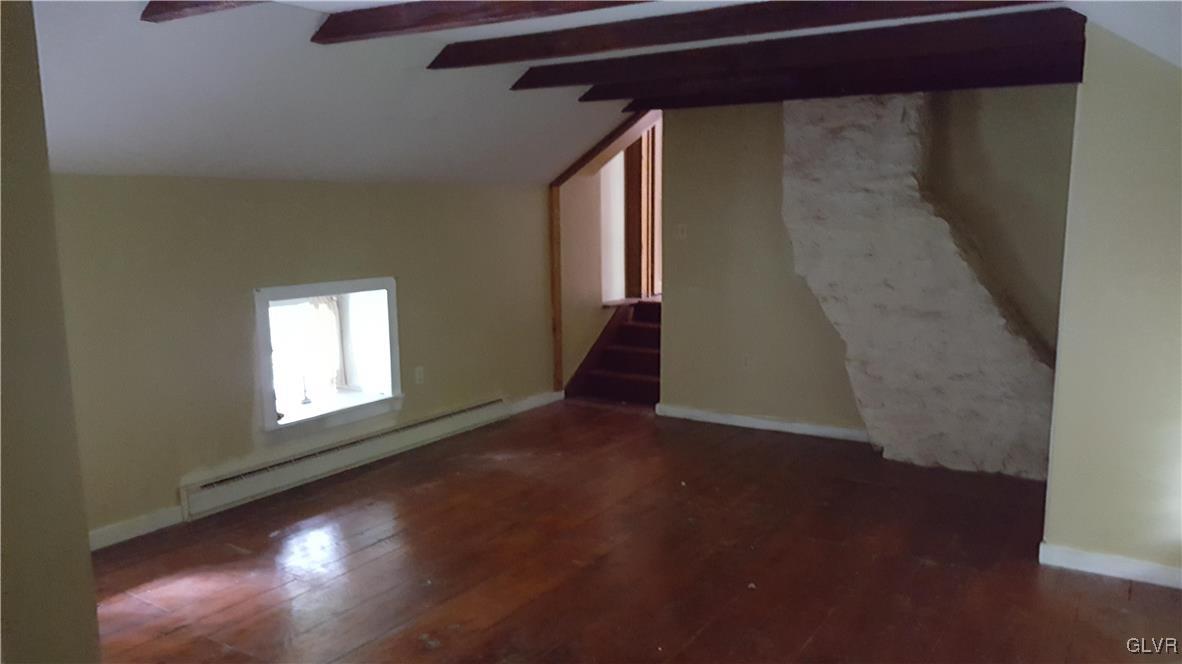10 Stouts Valley Road Easton, PA 18042 - Photo 13 of 35 an empty room with wooden floor and windows