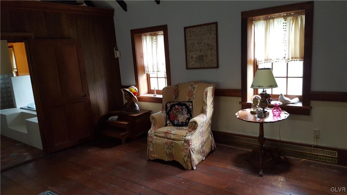 10 Stouts Valley Road Easton, PA 18042 - Photo 15 of 35 a living room with furniture and a potted plant