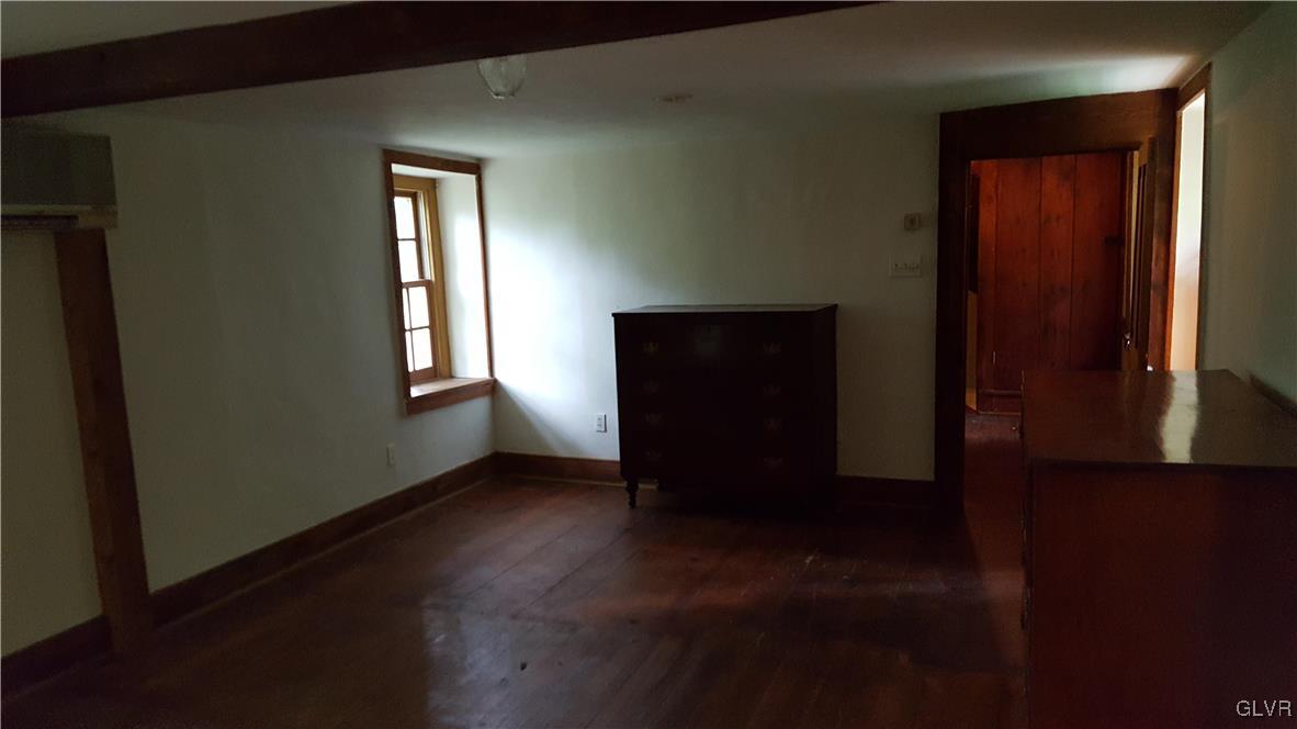 10 Stouts Valley Road Easton, PA 18042 - Photo 19 of 35 an empty room with wooden floor and windows