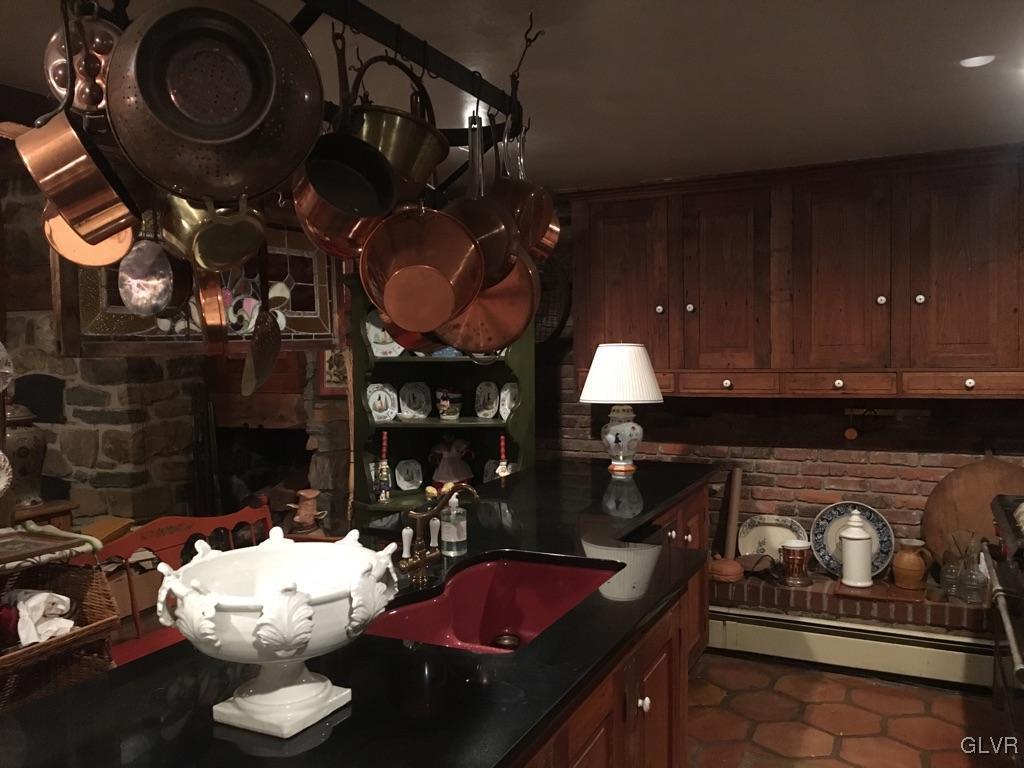 10 Stouts Valley Road Easton, PA 18042 - Photo 26 of 35 a kitchen with a stove a microwave and cabinets