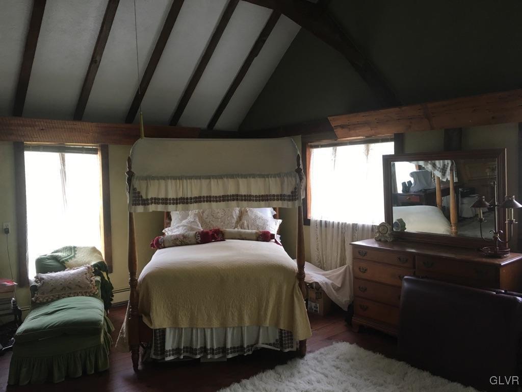 10 Stouts Valley Road Easton, PA 18042 - Photo 33 of 35 a bedroom with a bed and a dresser next to a window