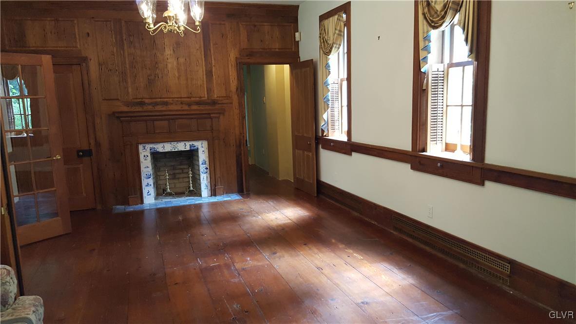10 Stouts Valley Road Easton, PA 18042 - Photo 9 of 35 a view of an empty room with wooden floor and a window