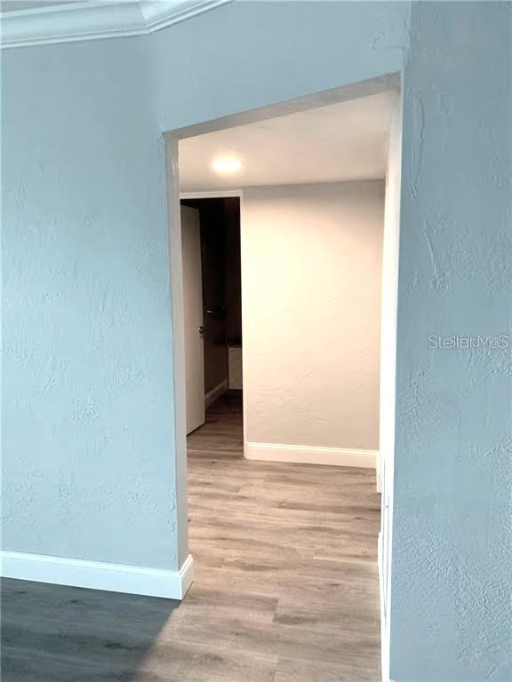2451 Canadian Way, Unit 59 Clearwater, FL 33763 - Photo 11 of 58 a view of a hallway with wooden floor