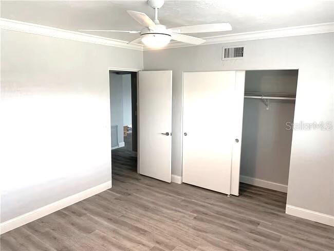 2451 Canadian Way, Unit 59 Clearwater, FL 33763 - Photo 13 of 58 a view of an empty room with wooden floor