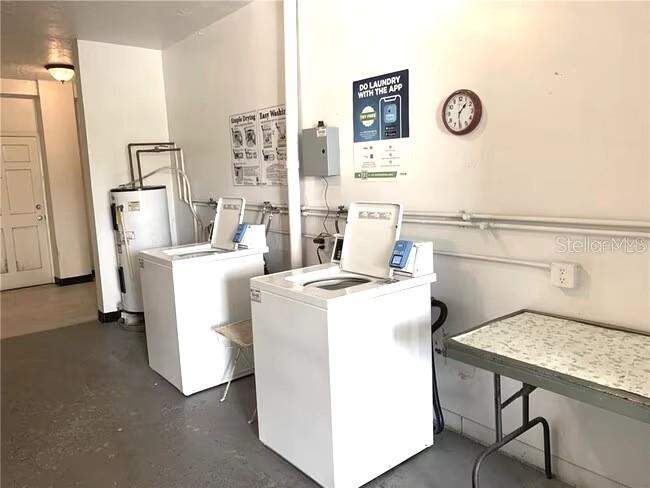 2451 Canadian Way, Unit 59 Clearwater, FL 33763 - Photo 31 of 58 a utility room with dryer and washer