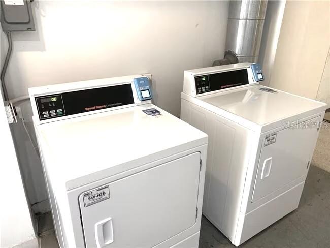 2451 Canadian Way, Unit 59 Clearwater, FL 33763 - Photo 32 of 58 a utility room with dryer and washer