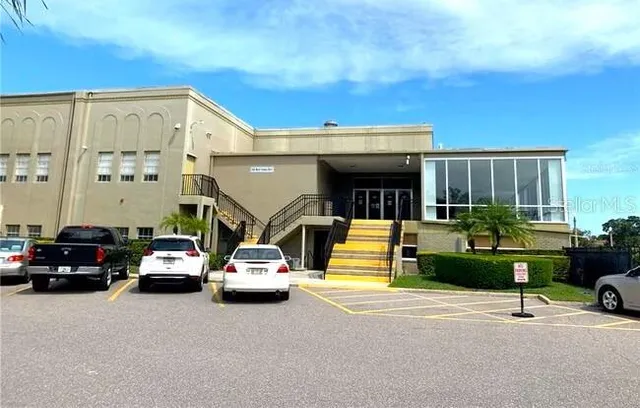 a view of living room with furniture and flat screen tv