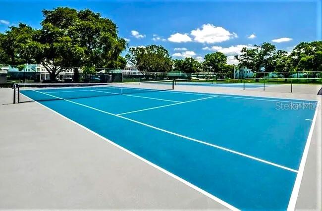 2451 Canadian Way, Unit 59 Clearwater, FL 33763 - Photo 47 of 58 a view of a tennis court