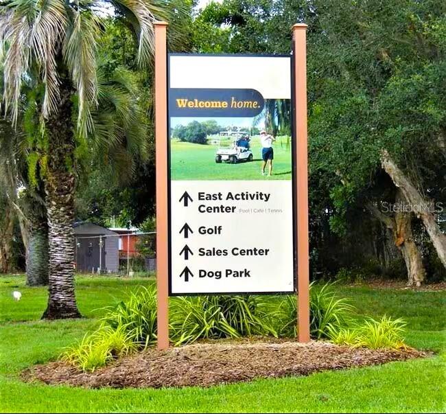 2451 Canadian Way, Unit 59 Clearwater, FL 33763 - Photo 55 of 58 a view of a back yard with green space