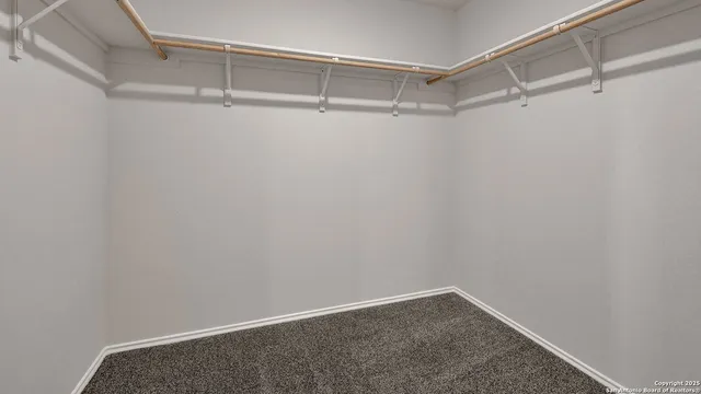 a view of a room with racks on the wall
