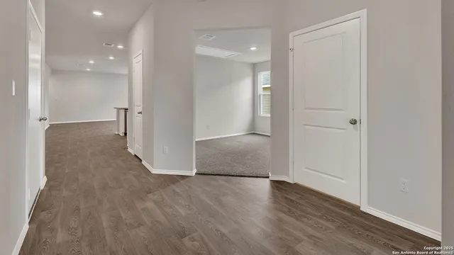 a view of livingroom with wooden floor