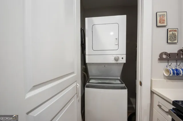 a utility room with washer and dryer