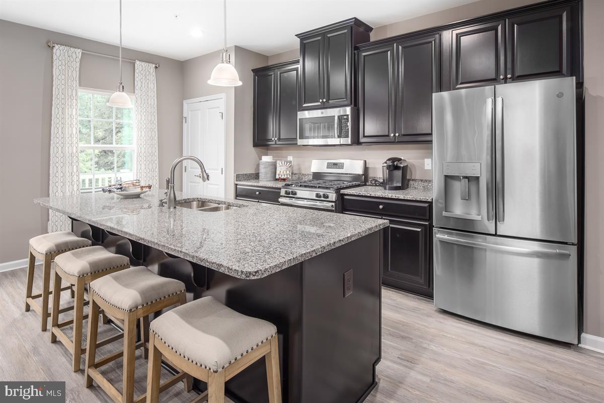7811 North Seneca Ridge Lane Hanover, MD 21076 - Photo 3 of 21 Stainless Steel Appliances and Large Island