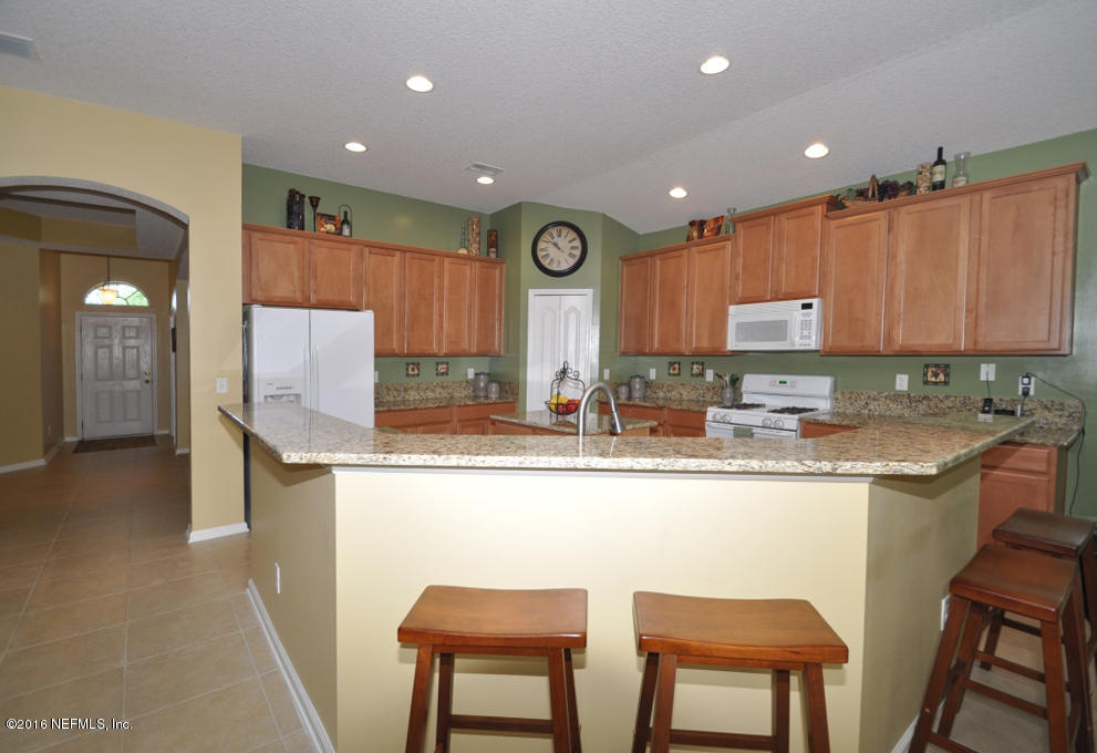 14462 Millhopper Road Jacksonville, FL 32258 - Photo 15 of 54 Kitchen Breakfast Bar