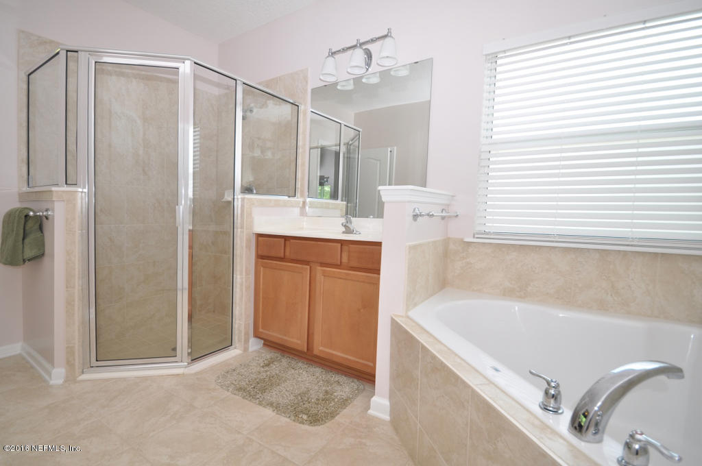14462 Millhopper Road Jacksonville, FL 32258 - Photo 26 of 54 Master Shower Tub and Vanity