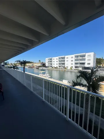 a view of a balcony with city view