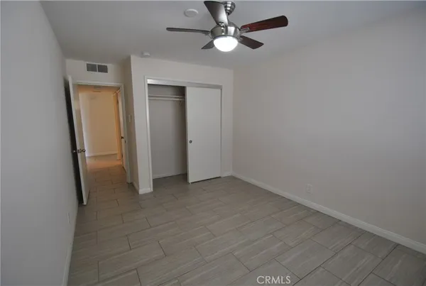 view of living room with furniture and floor to ceiling window