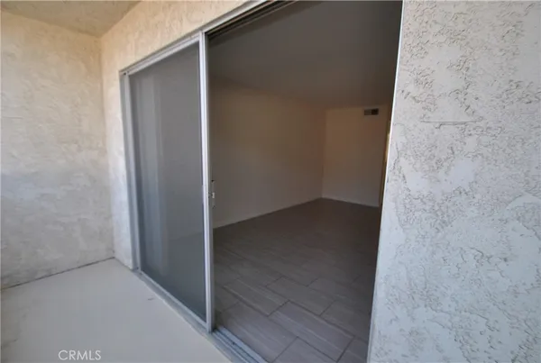 a picture with a white wall and a painting