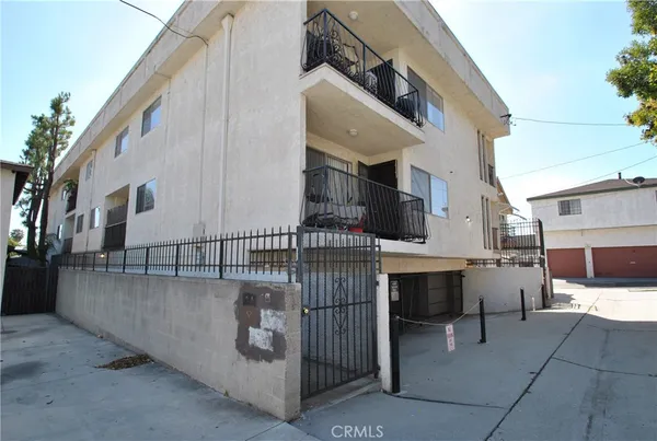 a kitchen with granite countertop a sink and a stove
