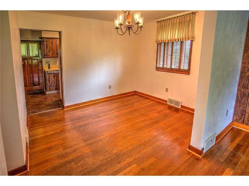 2201 Ridge Road McKeesport, PA 15135 - Photo 3 of 19 Dining Room. The hardwood floors extend into the formal dining room which has been freshly painted. Host family and friends for holiday dinners.