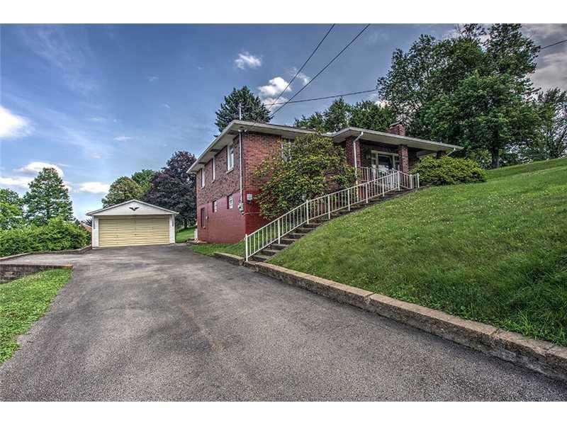 2201 Ridge Road McKeesport, PA 15135 - Photo 7 of 19 Exterior Front. The large driveway features a turn around space.